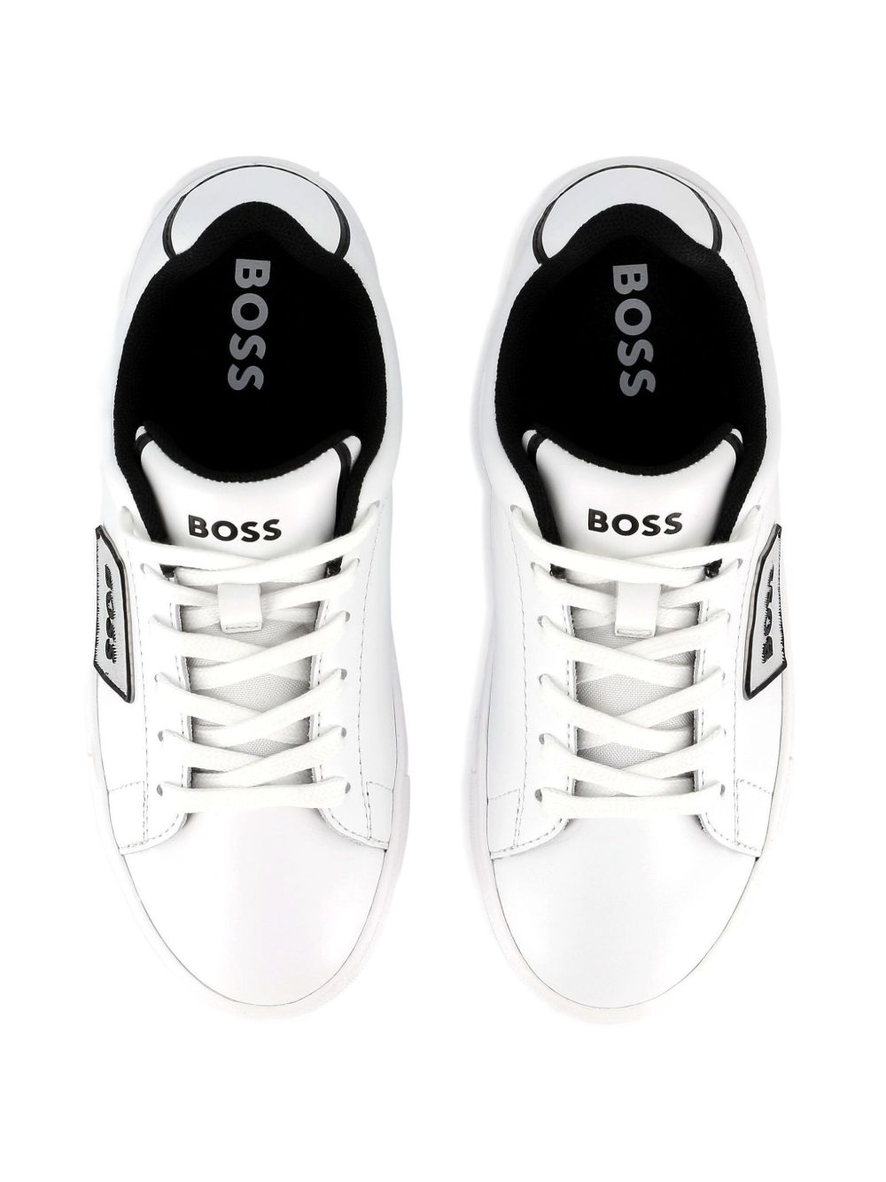 Sneakers per bambino BOSS Kids bianche con dettaglio con placca con logo J52554 10P BOSS KIDS
