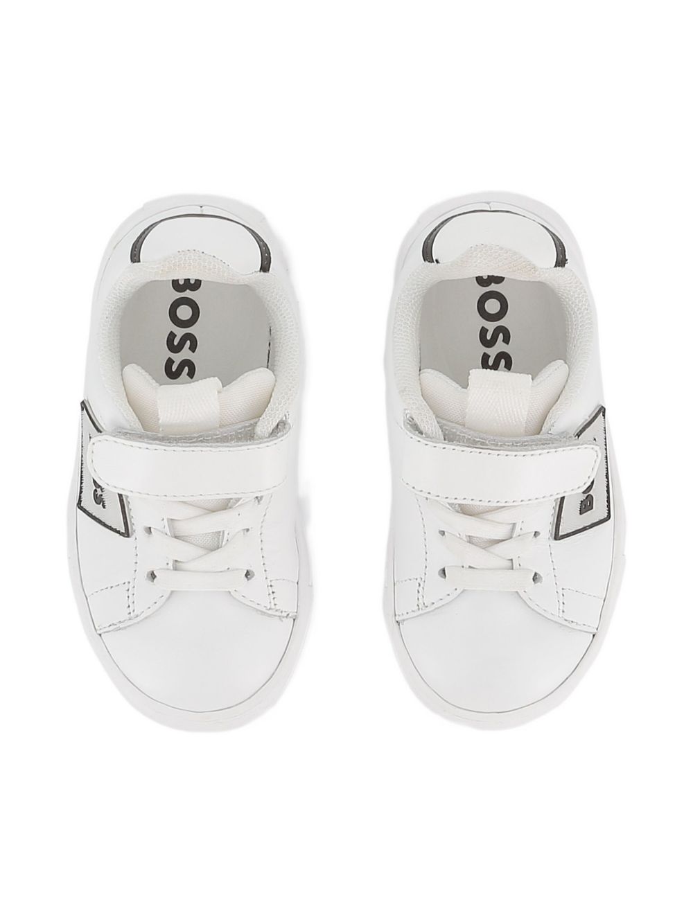 Sneakers per bambino BOSS Kids bianche con applicazione con logo J52573 10P BOSS KIDS