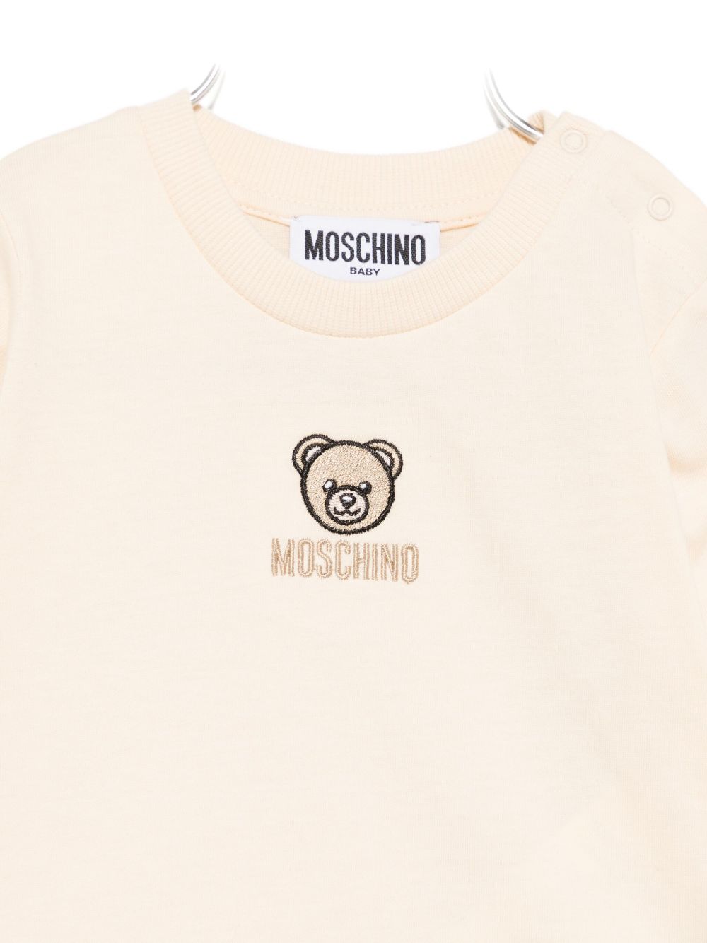 T-shirt per neonati Moschino Kids beige con motivo Teddy Bear ricamato M9O00RLAA10 20404 MOSCHINO KIDS