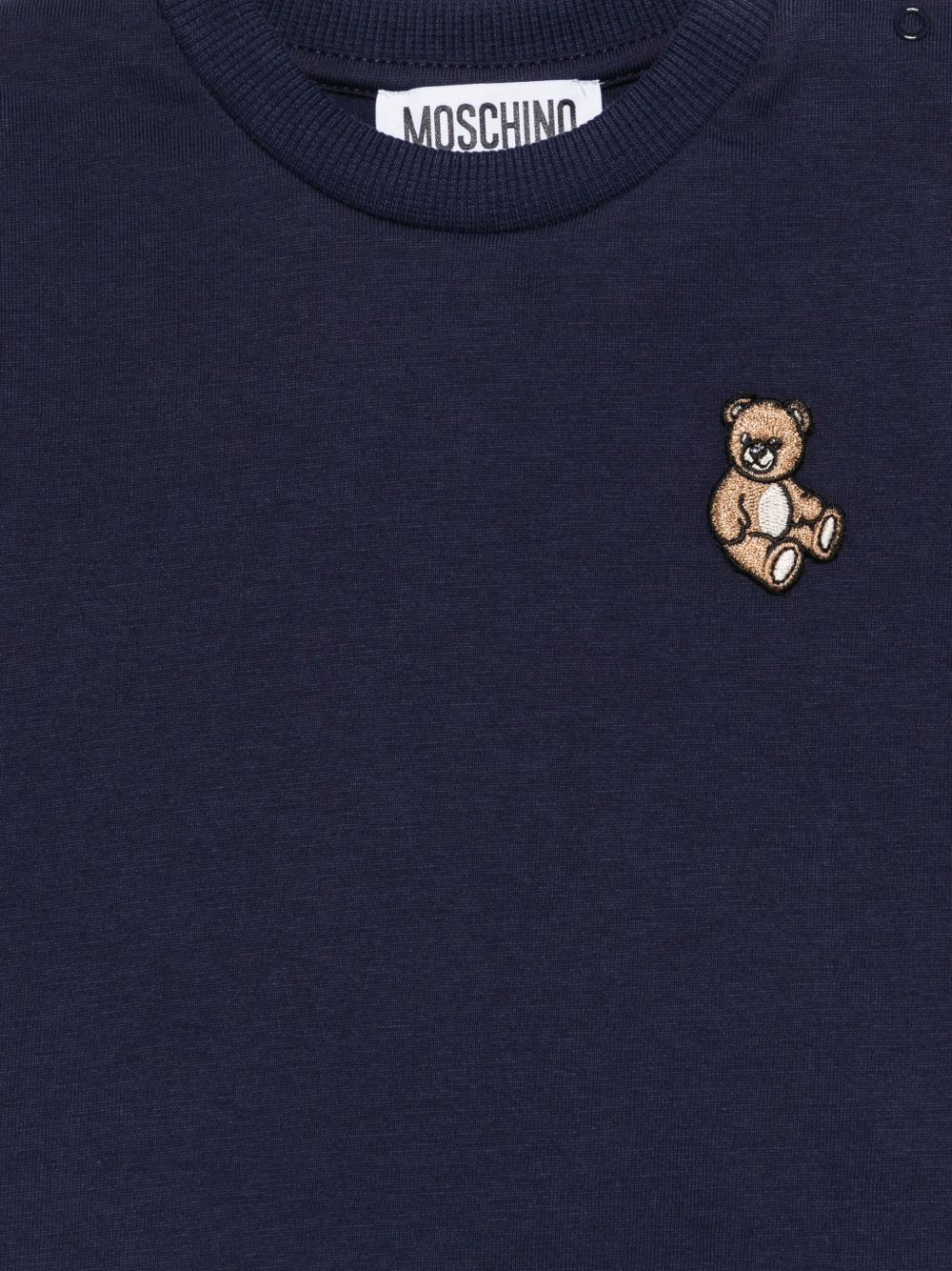 T-shirt per neonati Moschino Kids blu con motivo Teddy Bear MXO00RLAA10 40016 MOSCHINO KIDS