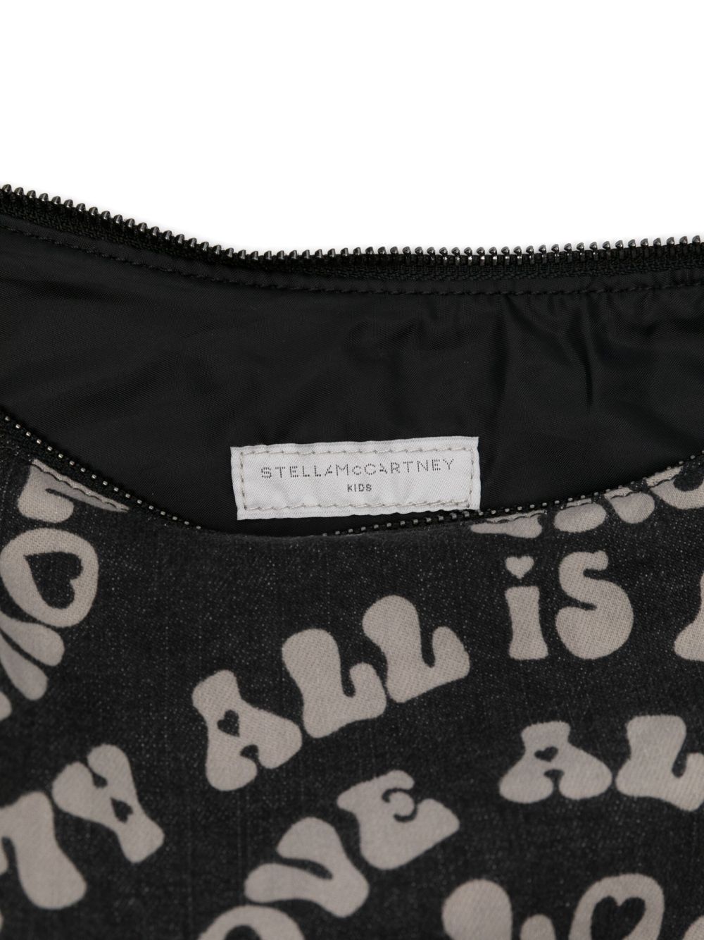 Borsa a mezzaluna per bambina Stella McCartney Kids nera con ciondolo a forma di labbra TX0D08 Z3113 961BC STELLA McCARTNEY KIDS