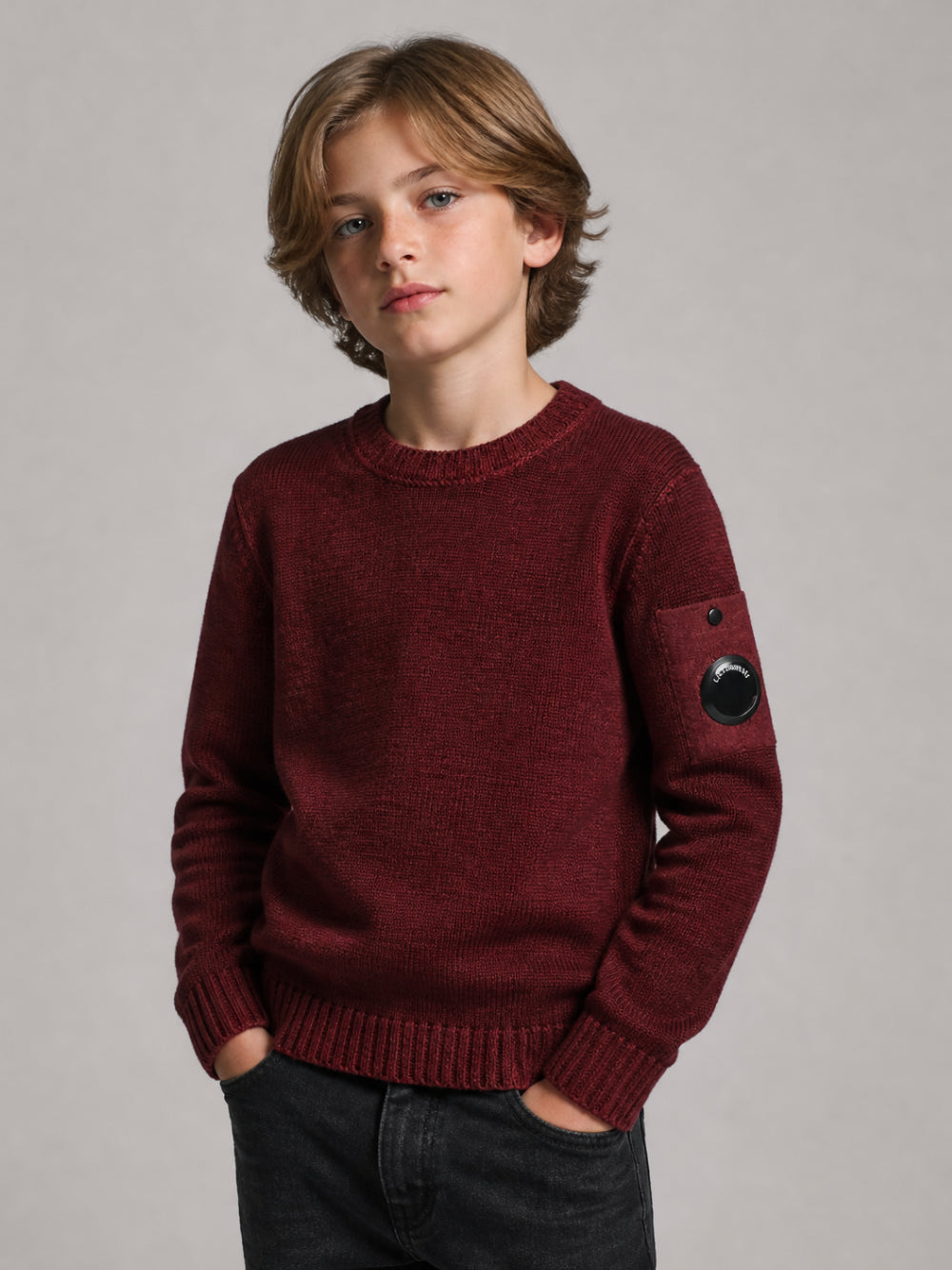 Maglione per bambino C.P. Company Kids bordeaux con applicazione sulla manica CNW00ALHC01 51686 C.P.COMPANY KIDS