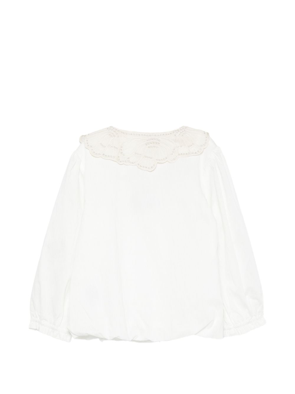 Camicetta per bambina Donsje Kids bianca con colletto smerlatoe e ricami floreali. 4125900 00029 DONSJE KIDS