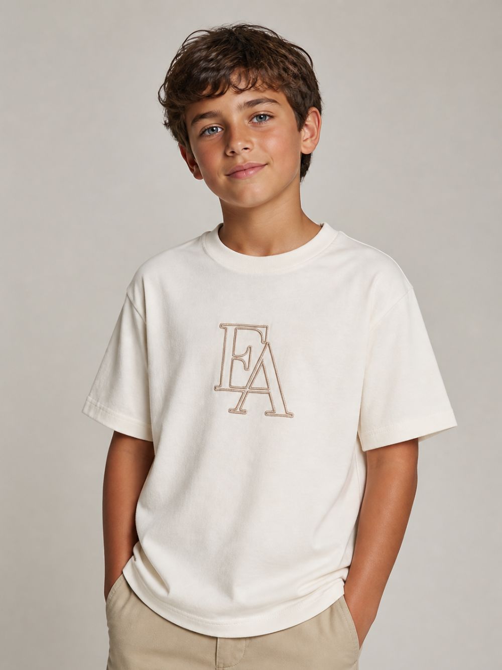 T-shirt per bambino Emporio Armani Kids bianca con lettere logo EB001367 AF26009 U1009 EMPORIO ARMANI KIDS