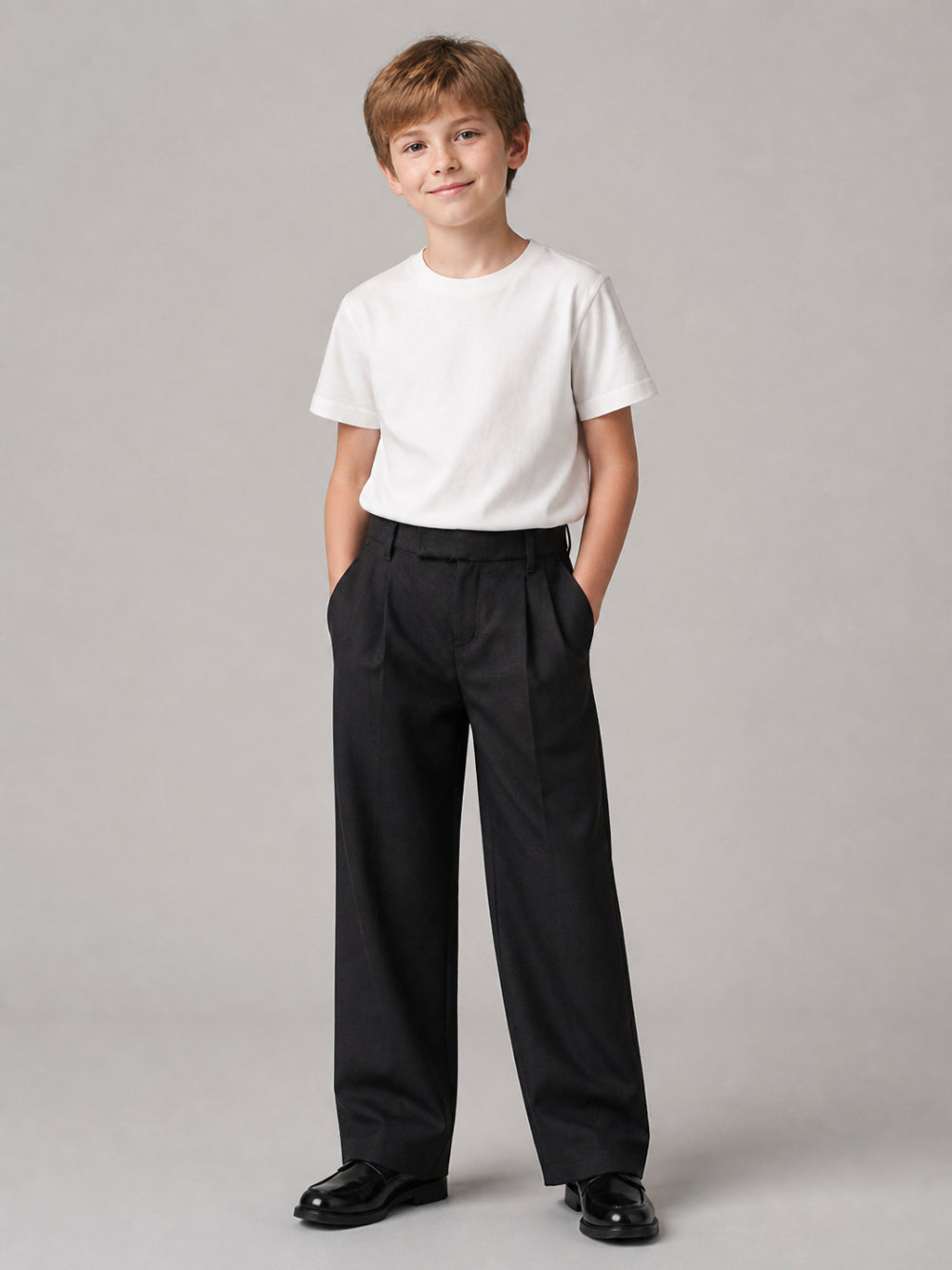 Pantaloni per bambino Emporio Armani Kids nero dritti con pieghe EB001567 AF26061 UB109 EMPORIO ARMANI KIDS