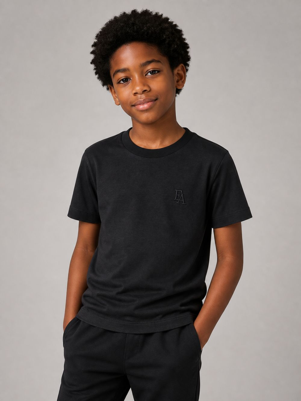 T-shirt per bambino Emporio Armani Kids blu con patch lettere EB001644 AF10127 UB118 EMPORIO ARMANI KIDS