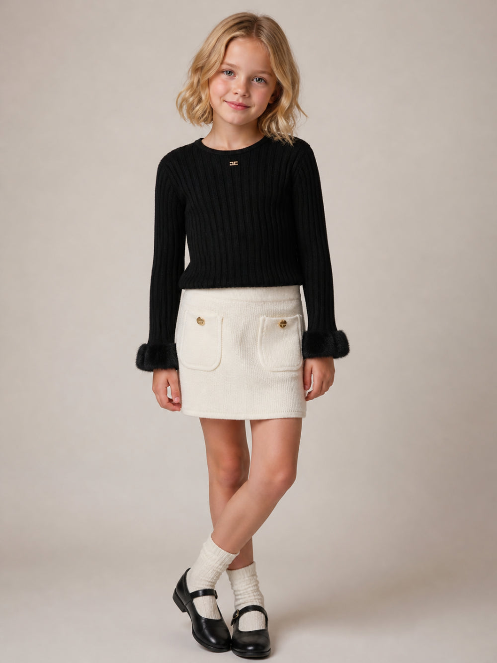 Maglione per bambina Elisabetta Franchi La Mia Bambina nero a coste con bordo in pelliccia sintetica EFMA214CFL040 N000 ElISABETTA FRANCHI KIDS
