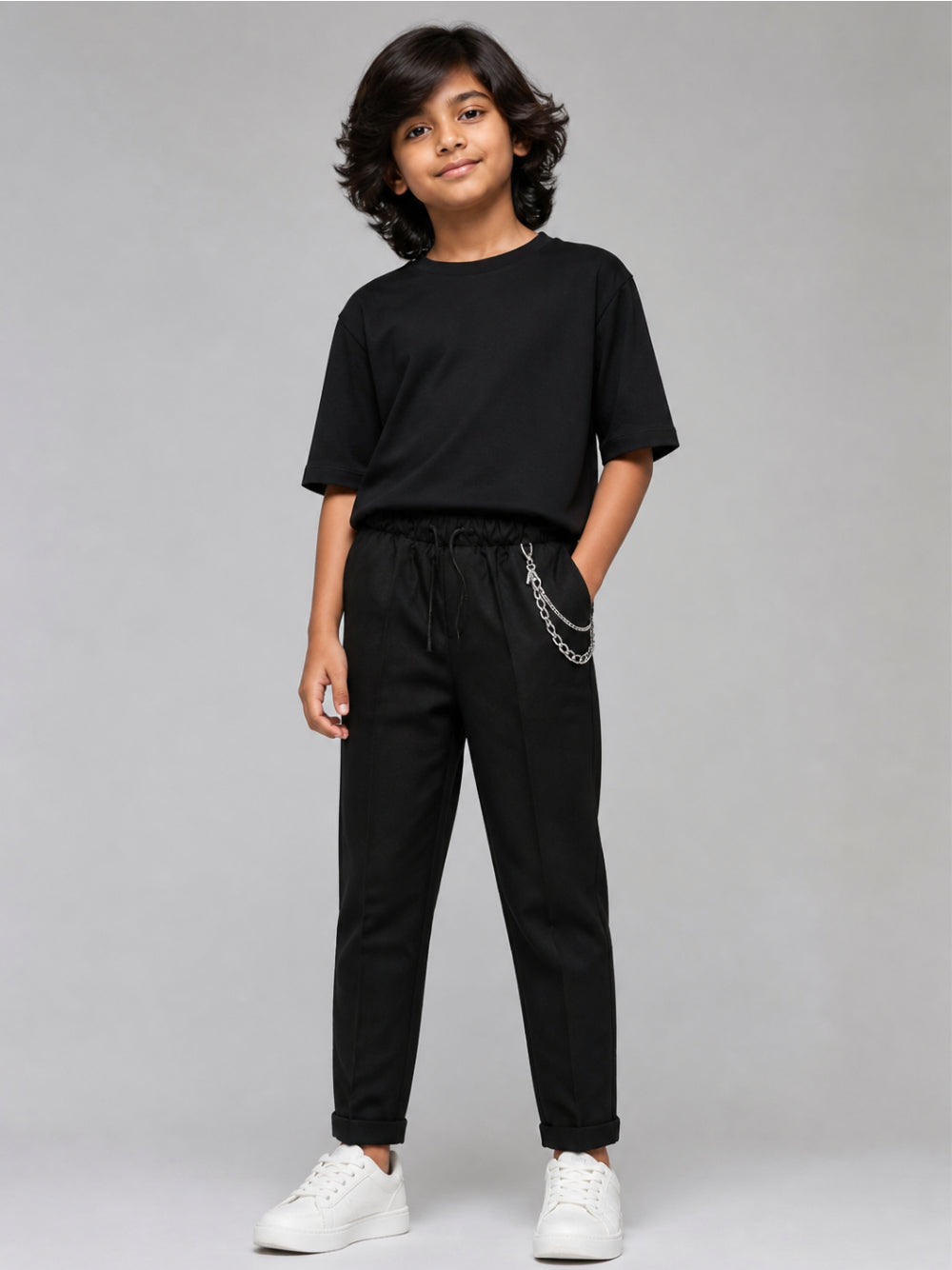 Pantaloni per bambino John Richmond Junior neri con dettaglio catena RBA26126PA BLACK JOHN RICHMOND KIDS