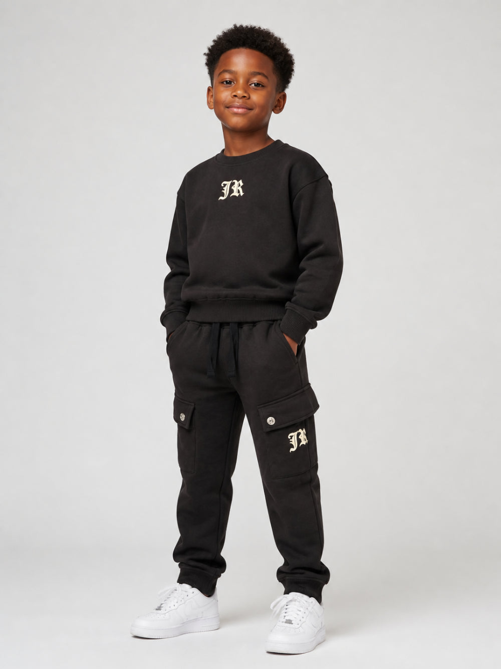Tuta due pezzi per bambino John Richmond Kids nero con logo sul davanti RBA26167CF BLACK JOHN RICHMOND KIDS