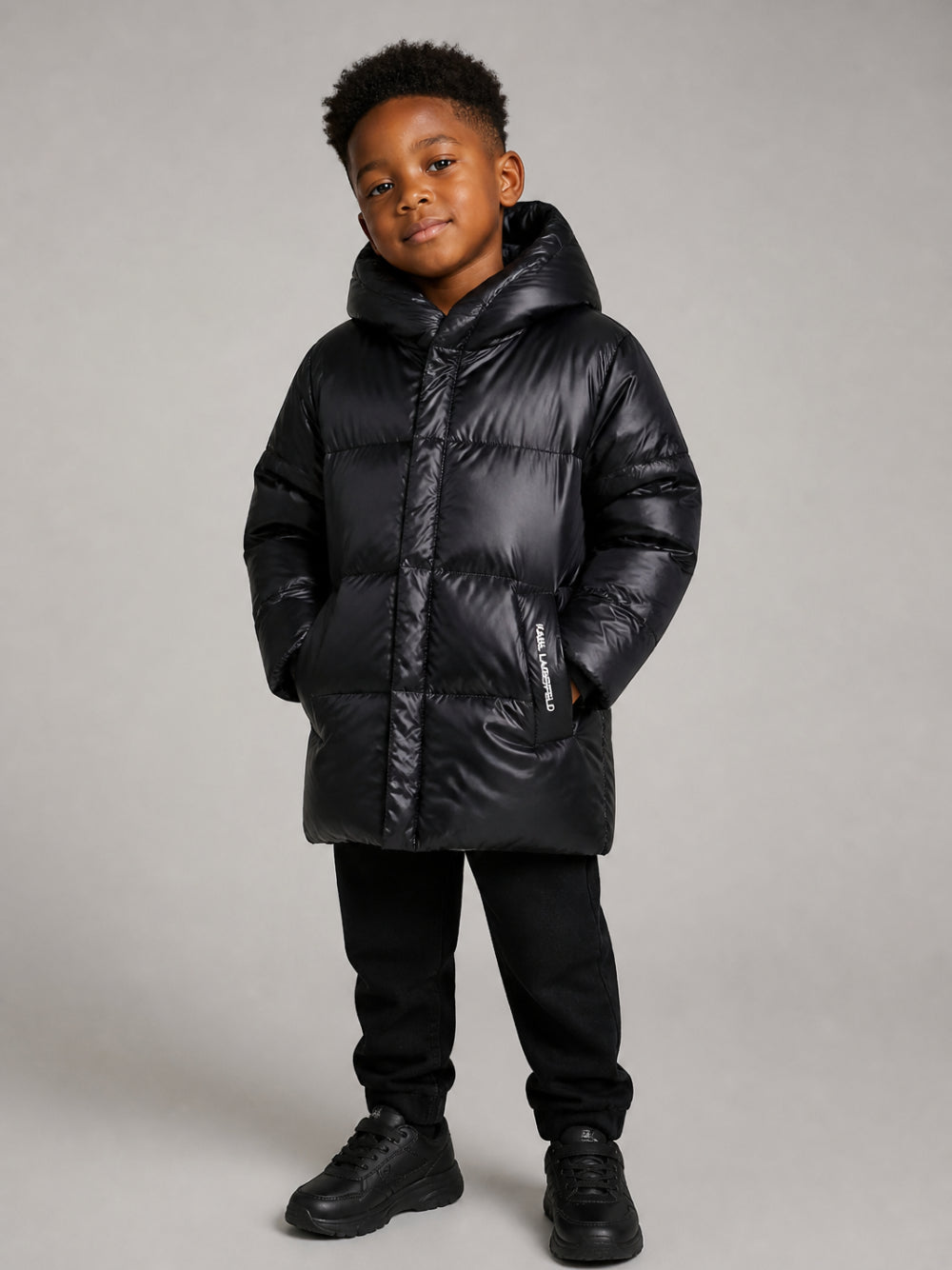 Piumino per bambino Karl Lagerfeld Kids nero con logo sulla tasca Z31355 09B KARL LAGERFELD KIDS