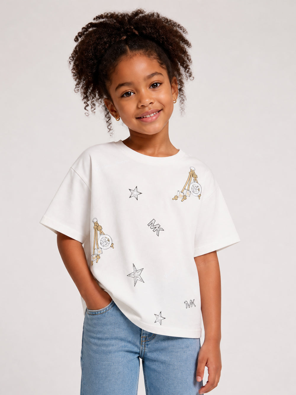 T-shirt per bambina Michael Kors Kids bianca con stampa stelle all-over R30689 117 MICHAEL KORS KIDS