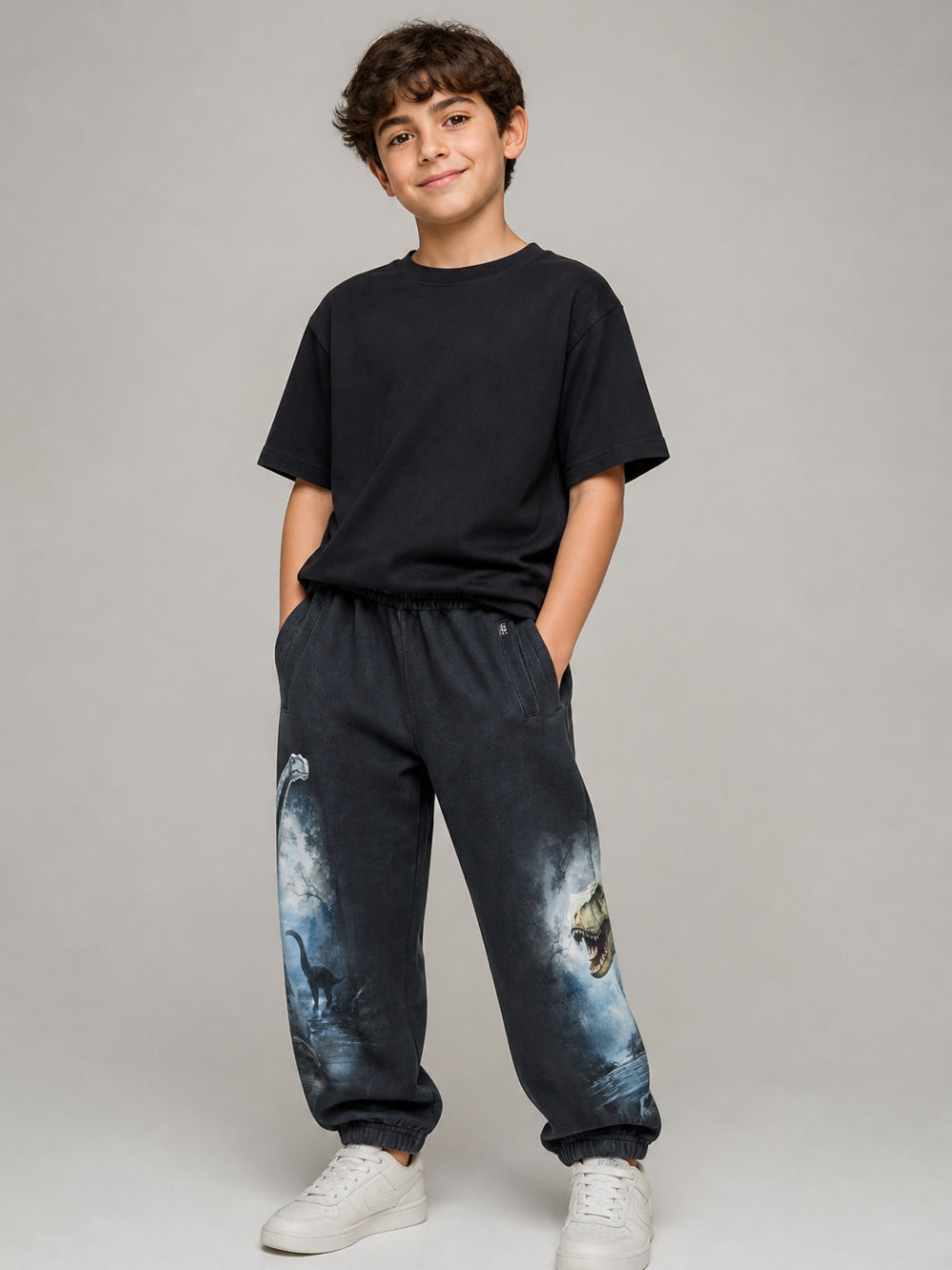 Pantaloni per bambino Molo Kids blu con stampa dinosauri 1W26I210 9946 MOLO KIDS