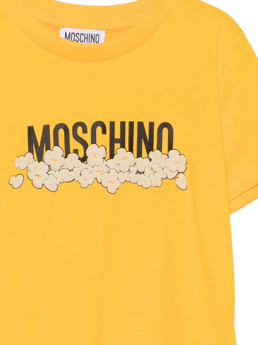 T-shirt per bambini Moschino Kids gialla con stampa grafica con logo H6M058LAA20 51140 MOSCHINO KIDS