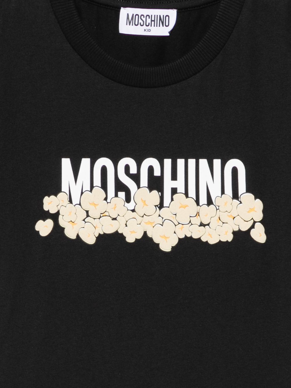 T-shirt per bambini Moschino Kids nera con stampa grafica con logo H6M058LAA20 60100 MOSCHINO KIDS