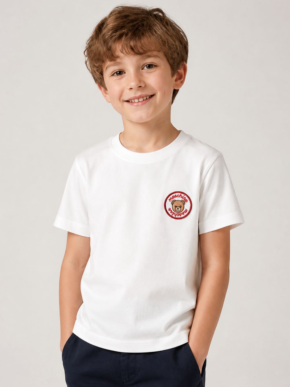 T-shirt per bambino Moschino Kids bianca con stampa Teddy Bear sul davanti H9M05GLAA59 10063 MOSCHINO KIDS