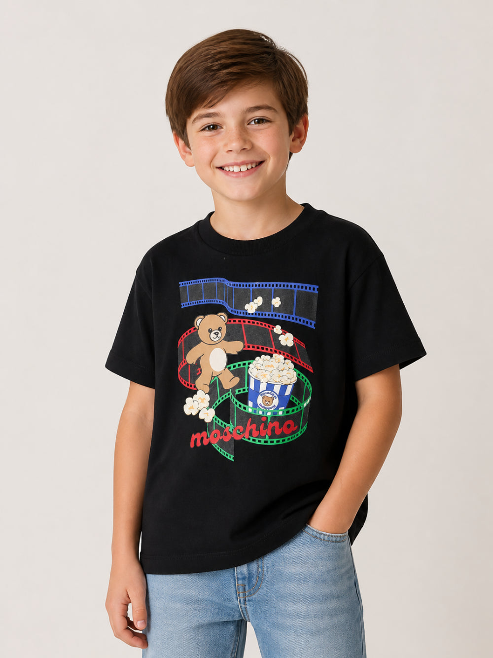T-shirt per bambini Moschino Kids nera con stampa grafica sul davanti HPM05WLAA10 60100 MOSCHINO KIDS