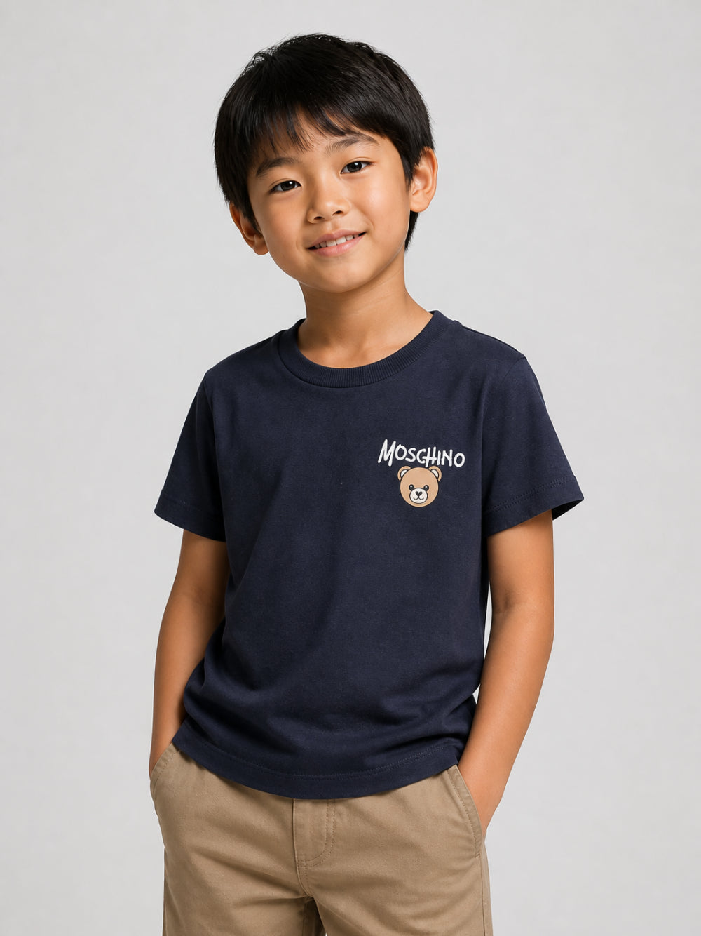 T-shirt per bambino Moschino Kids blu con stampa logo sul davanti HUM05VLAA34 40016 MOSCHINO KIDS