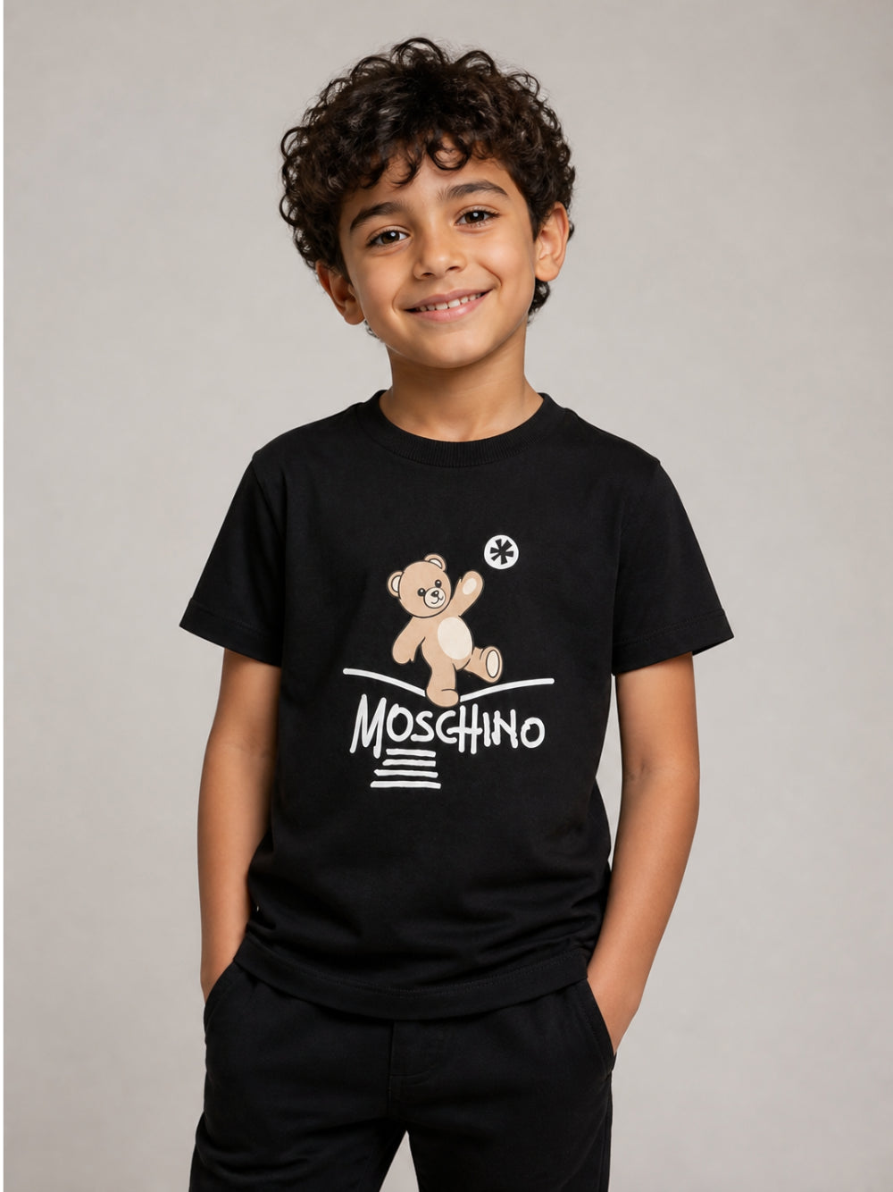 T-shirt per bambini Moschino Kids nera con motivo Teddy Bear HUM05XLAA20 60100 MOSCHINO KIDS