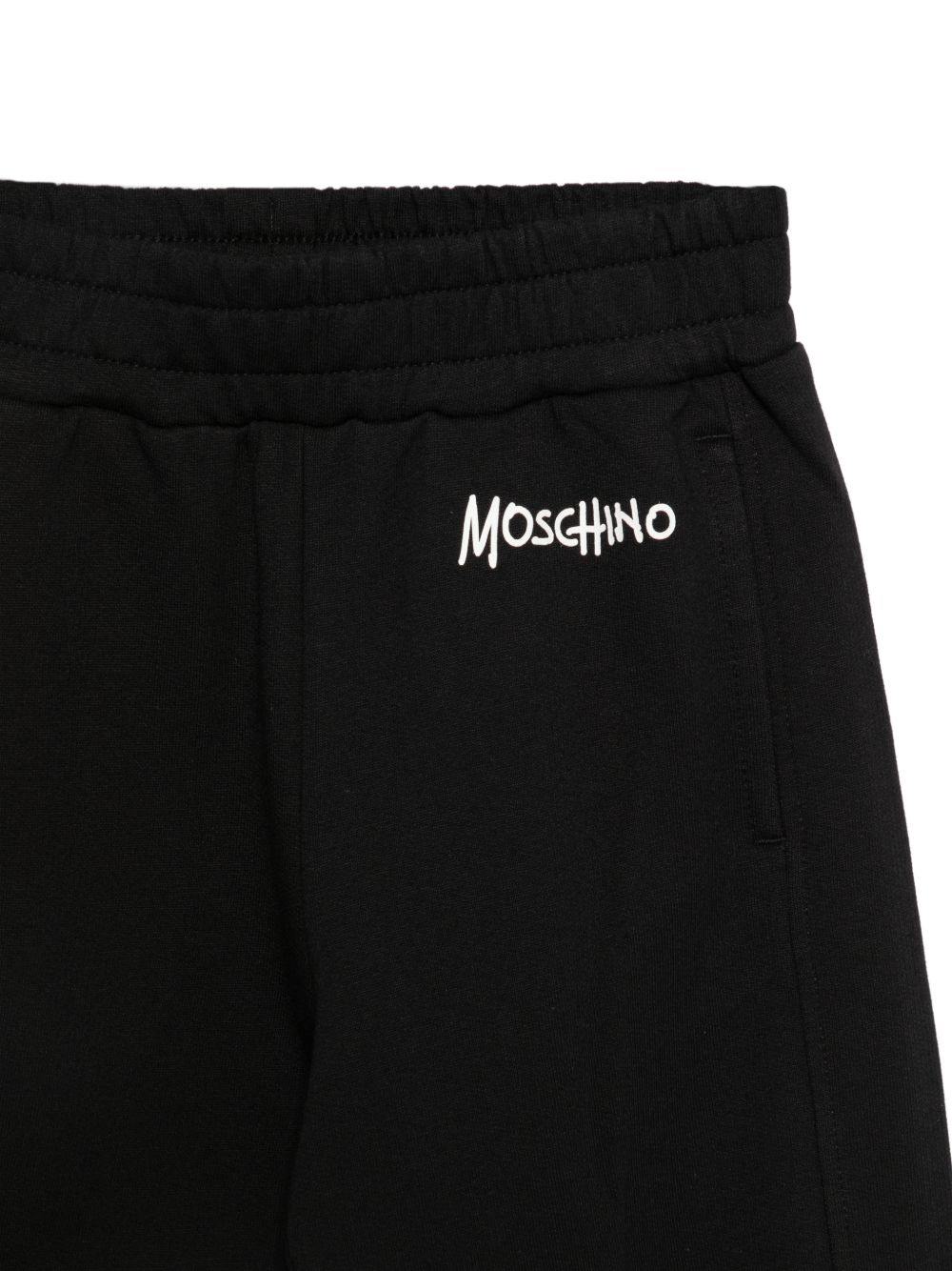 Pantatuta per bambino Moschino Kids nero con stampa logo sul davanti HUP09CLCA83 60100 MOSCHINO KIDS
