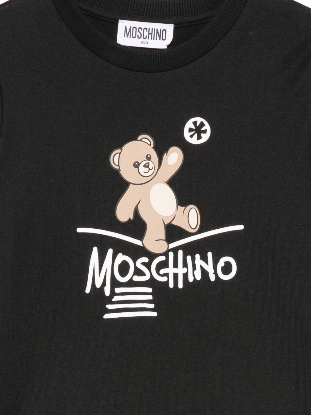 T-shirt per bambini Moschino Kids nera con motivo Teddy Bear HZO00JLAA20 60100 MOSCHINO KIDS