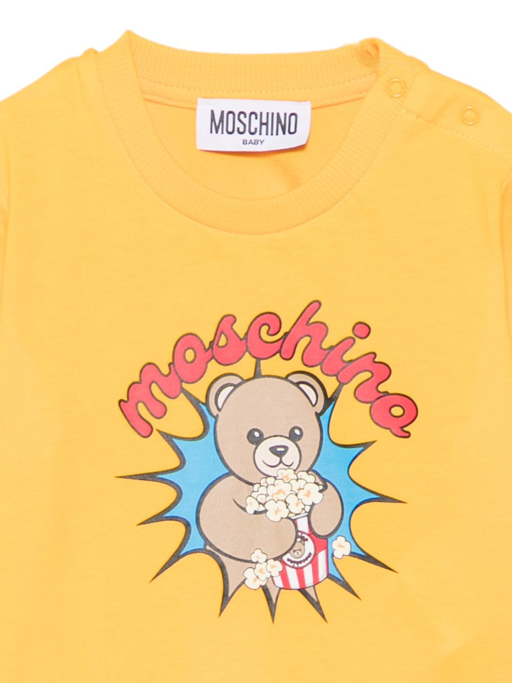 T-shirt per neonato Moschino Kids gialla con stampa popcorn con orsacchiotto MUM04WLAA57 51140 MOSCHINO KIDS