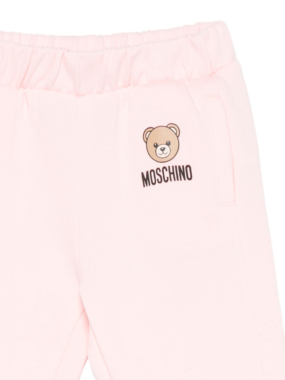 Pantaloni per neonata Moschino Kids rosa con motivo Teddy Bear MUP05XLCA92 50209 MOSCHINO KIDS