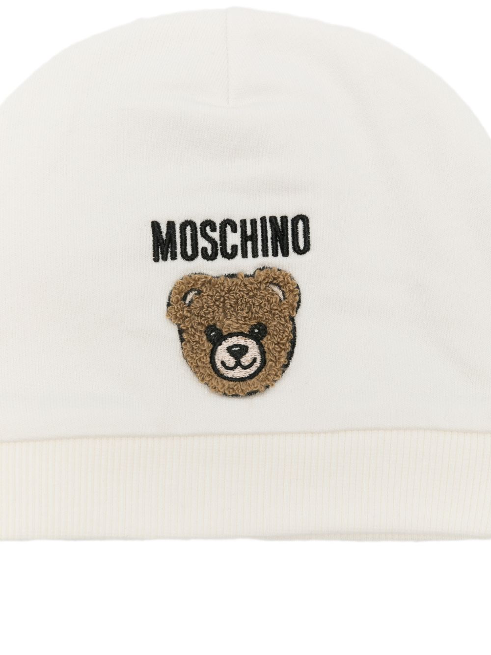 Cappellino per neonati Moschino Kids bianco con ricamo Teddy Bear MUX065LCA93 10063 MOSCHINO KIDS