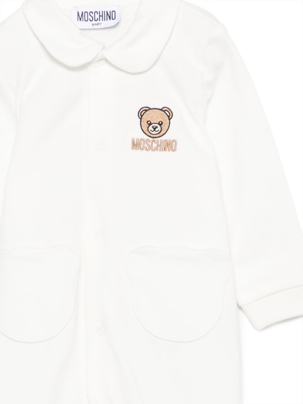 Tutina per neonati Moschino Kids bianca con motivo orsetto ricamato sul davanti MUY09DLCA40 10063 MOSCHINO KIDS
