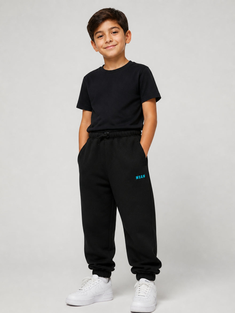 Pantatuta per bambino Msgm Kids nera con due tasche laterali a fessura F6MSJUFP305 110 MSGM KIDS