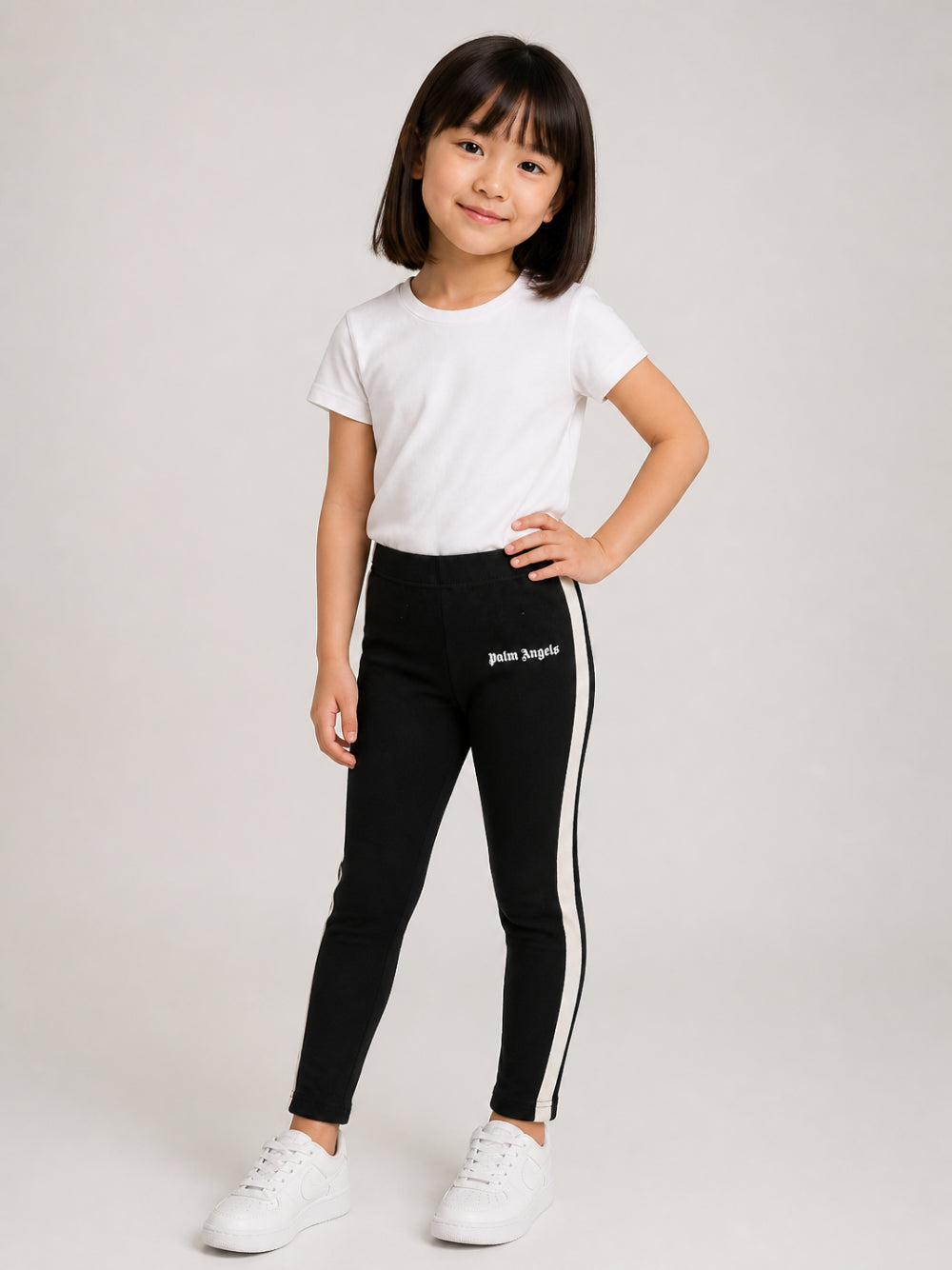 Leggings per bambina Palm Angels Kids nero con stampa logo sul davanti F6PAJGLG038 110 PALM ANGELS KIDS