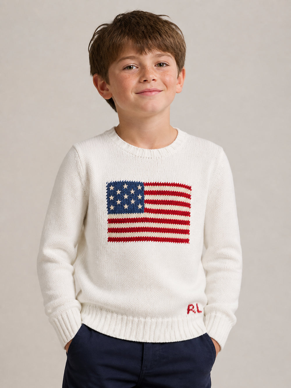 Maglione per bambino Polo Ralph Lauren Kids bianco con bandiera americana ricamata sul davanti 322668285 006 Ralph Lauren kids