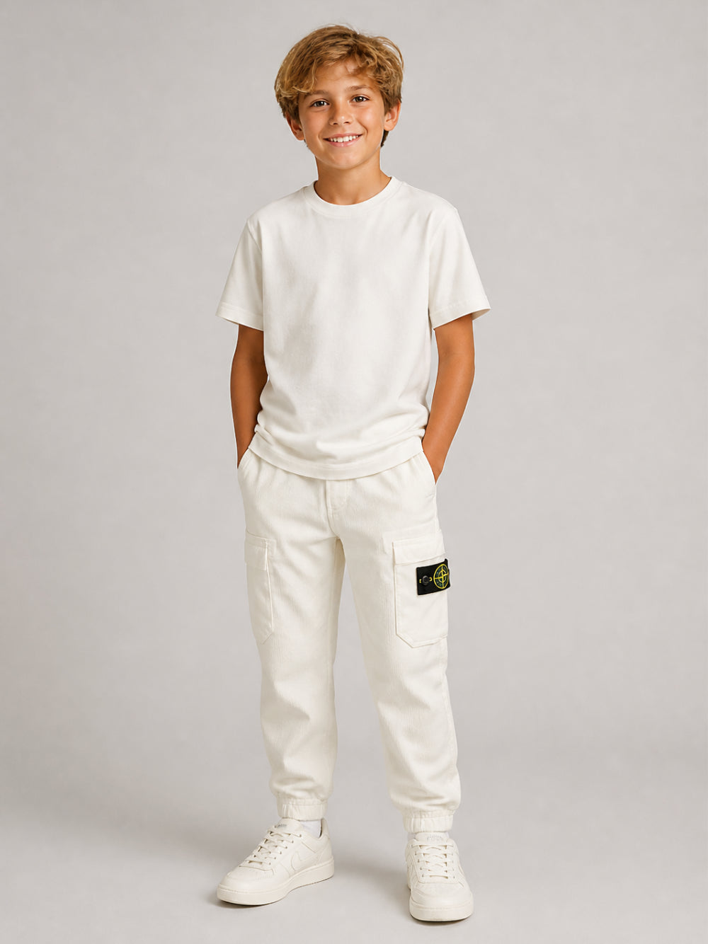 Pantaloni cargo per bambino Stone Island Kids bianchi in velluto a coste L2S163100005S0199 V0097 STONE ISLAND KIDS