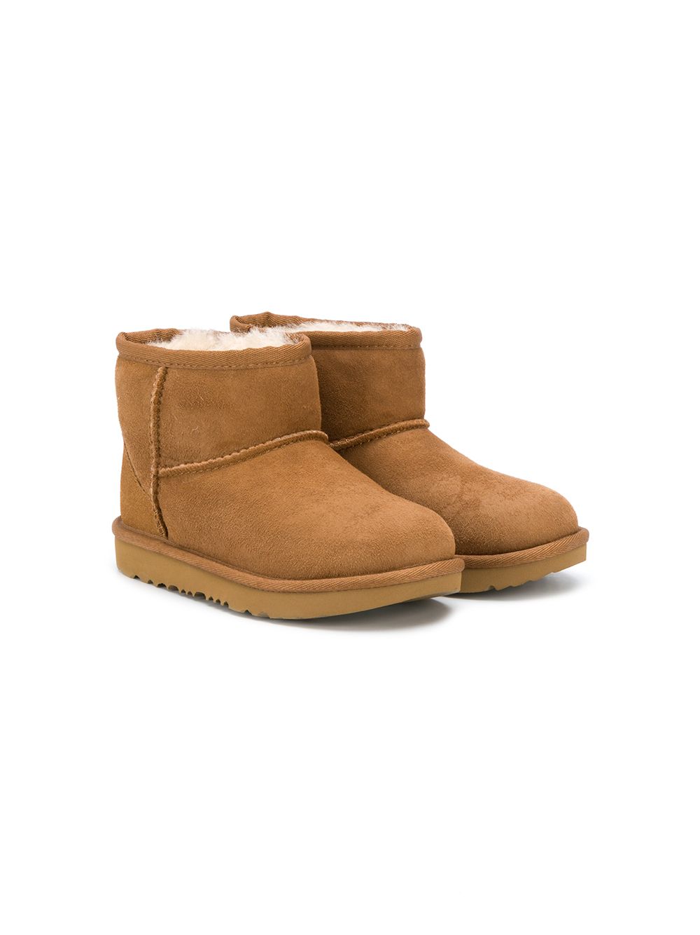 Stivali Classic II mini per bambina UGG Kids marrone con fodera in shearling 1017715K CHE UGG KIDS