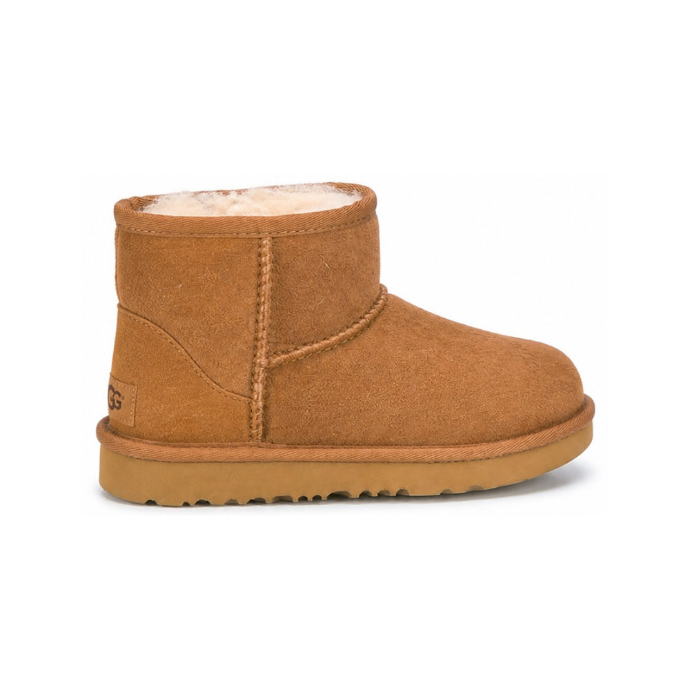 Stivali Classic II mini per bambina UGG Kids marrone con fodera in shearling 1017715K CHE UGG KIDS