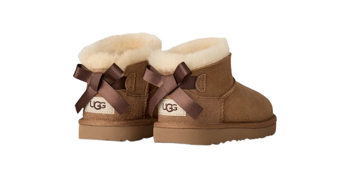 Stivali Ultra Mini Bailey Bow per bambina Ugg Kids marroni con fiocco in raso sul retro 1185920K CHE UGG KIDS
