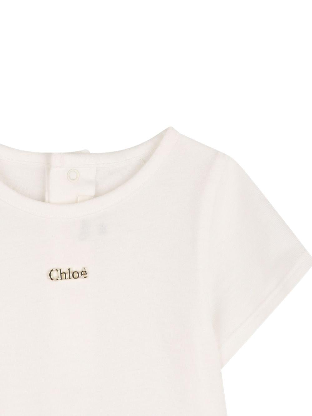 Body per neonata Chloé Kids arancione e bianco a fiori con ruches - Rubino Kids