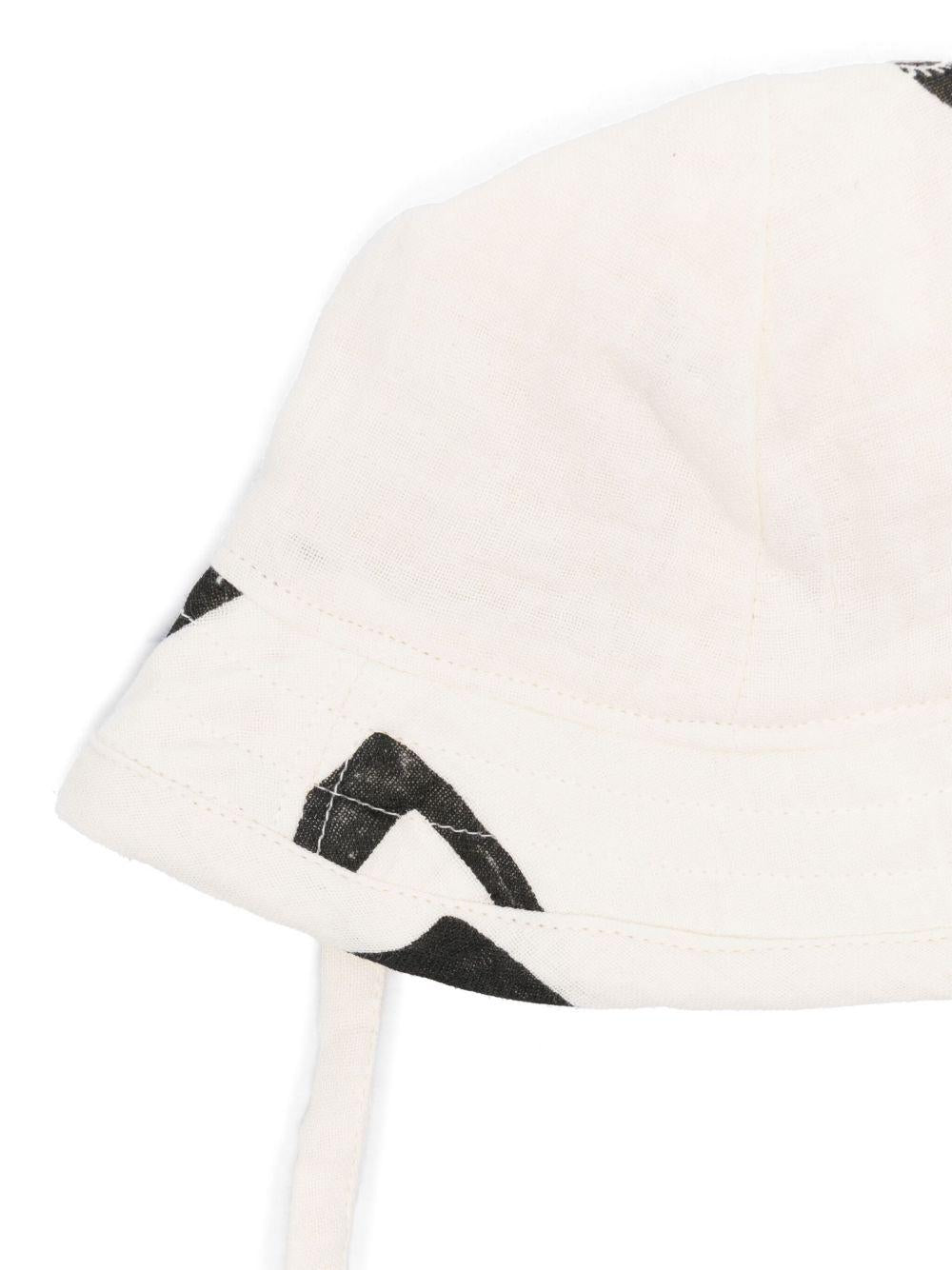 Cappello per bambini Mini Rodini Note bianco con stampa all - over - Rubino Kids