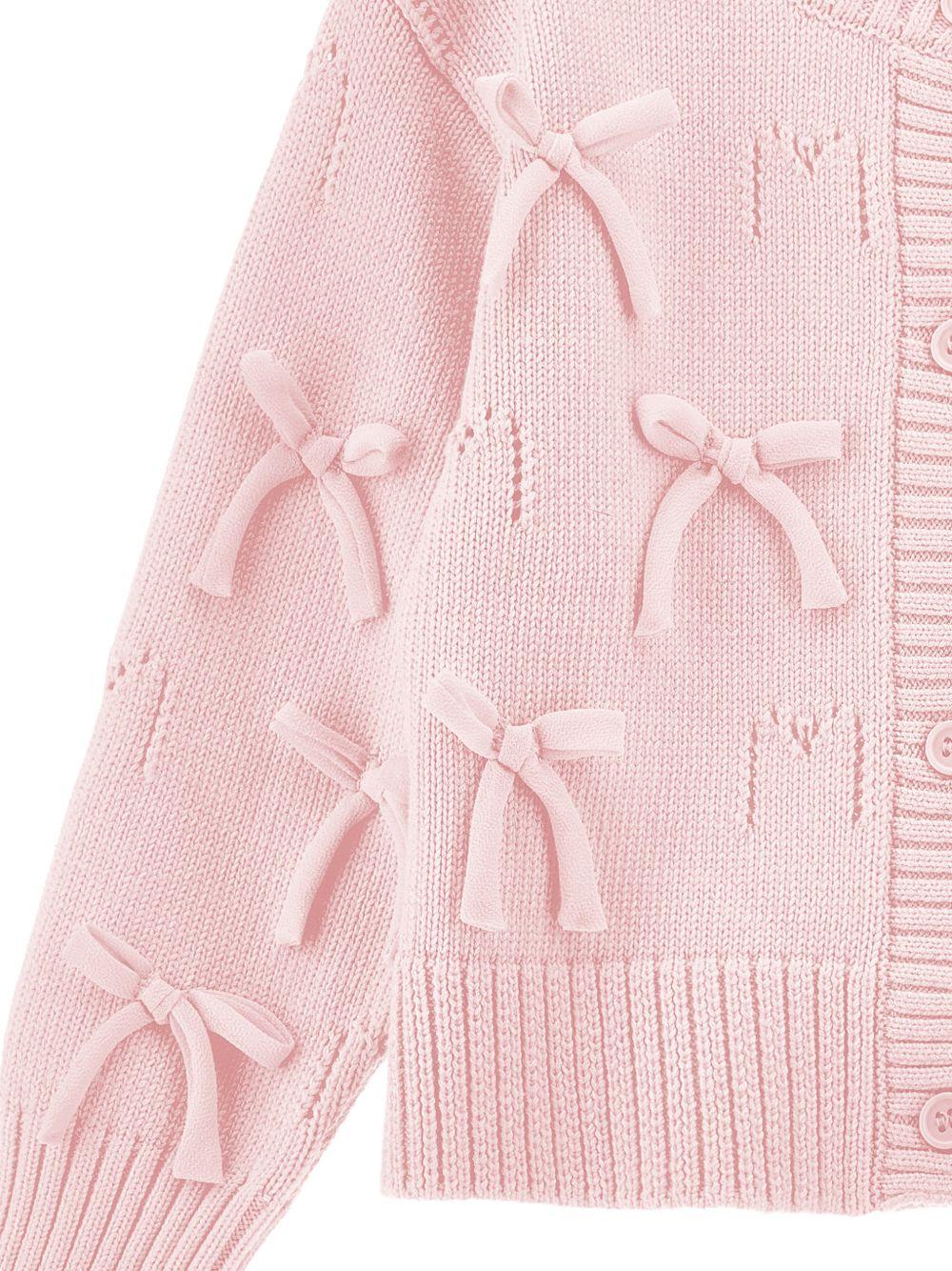Cardigan per bambina Monnalisa rosa con dettaglio fiocchi - Rubino Kids