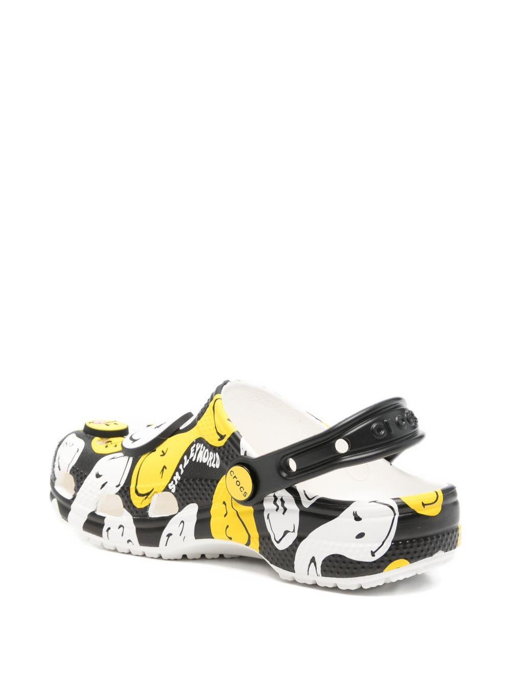 Ciabatte per bambini Crocs Kids multicolore con design Smiley Classic K - Rubino Kids