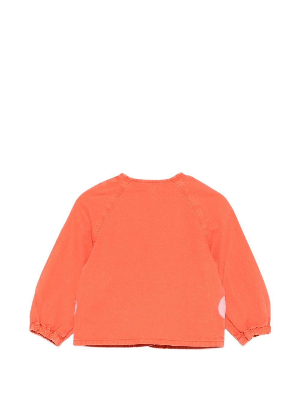 Giubbino per bambina Stella McCartney Kids arancione con applicazioni floreali - Rubino Kids
