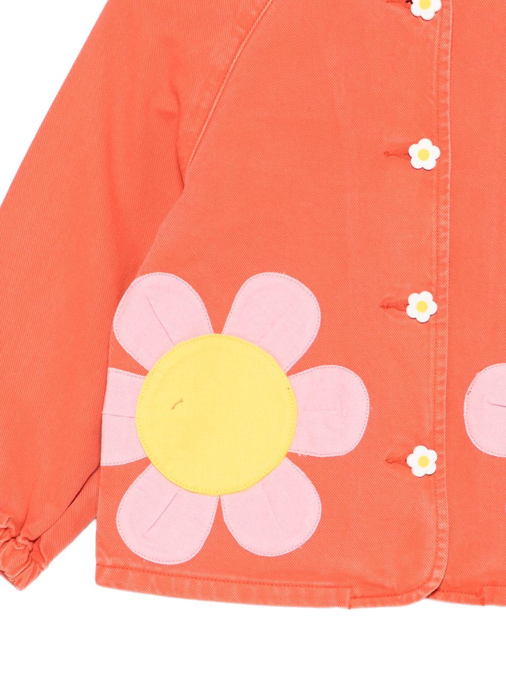 Giubbino per bambina Stella McCartney Kids arancione con applicazioni floreali - Rubino Kids