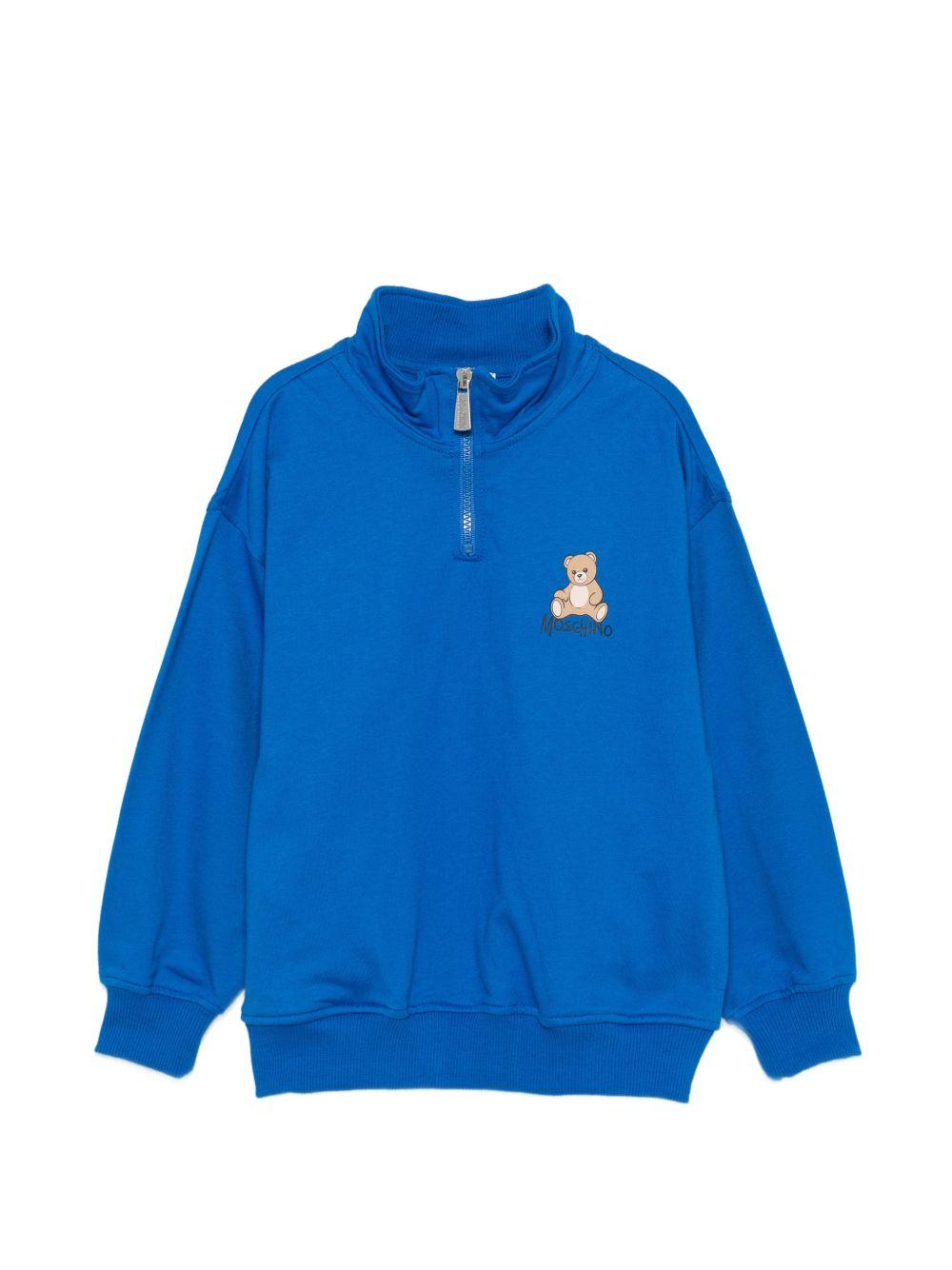 Felpa per bambino Moschino Kids blu con mezza zip HUF0A0LCA94 40157 MOSCHINO KIDS