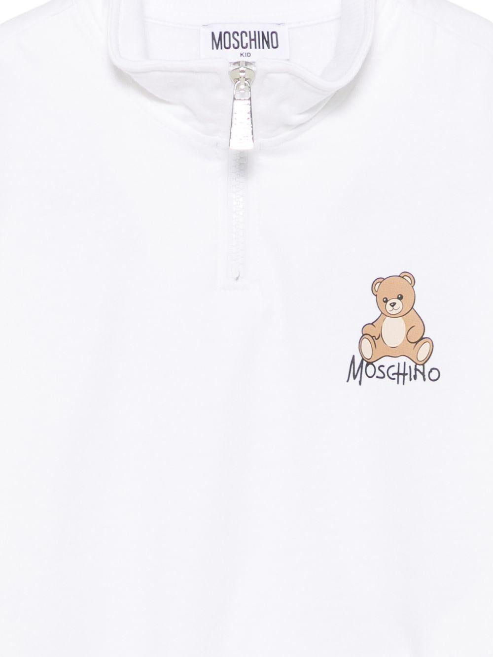 Felpa per bambino Moschino Kids bianca con mezza zip HUF0A0LCA94 10101 MOSCHINO KIDS