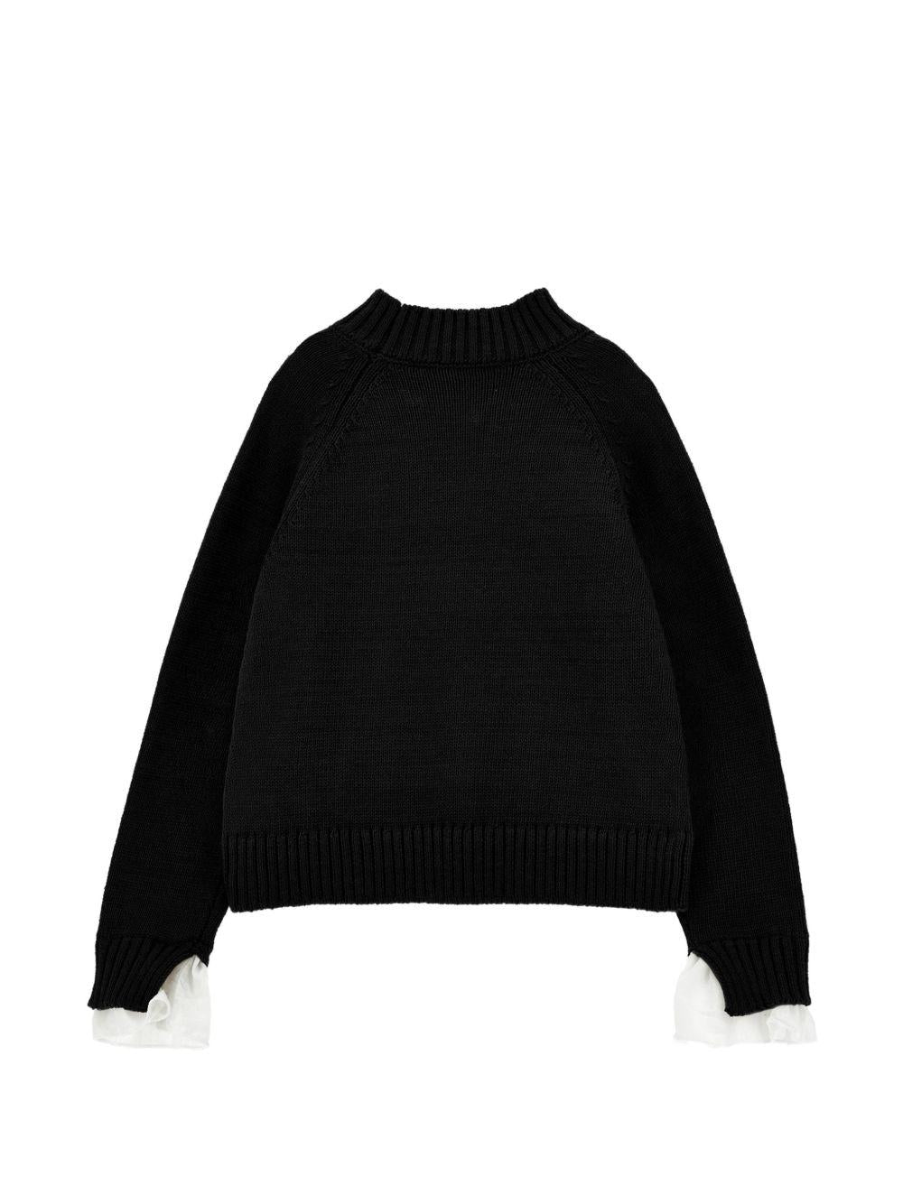 Maglione per bambina Monnalisa Kids nero con design lavorato a maglia 17H601 8060 0050 MONNALISA KIDS