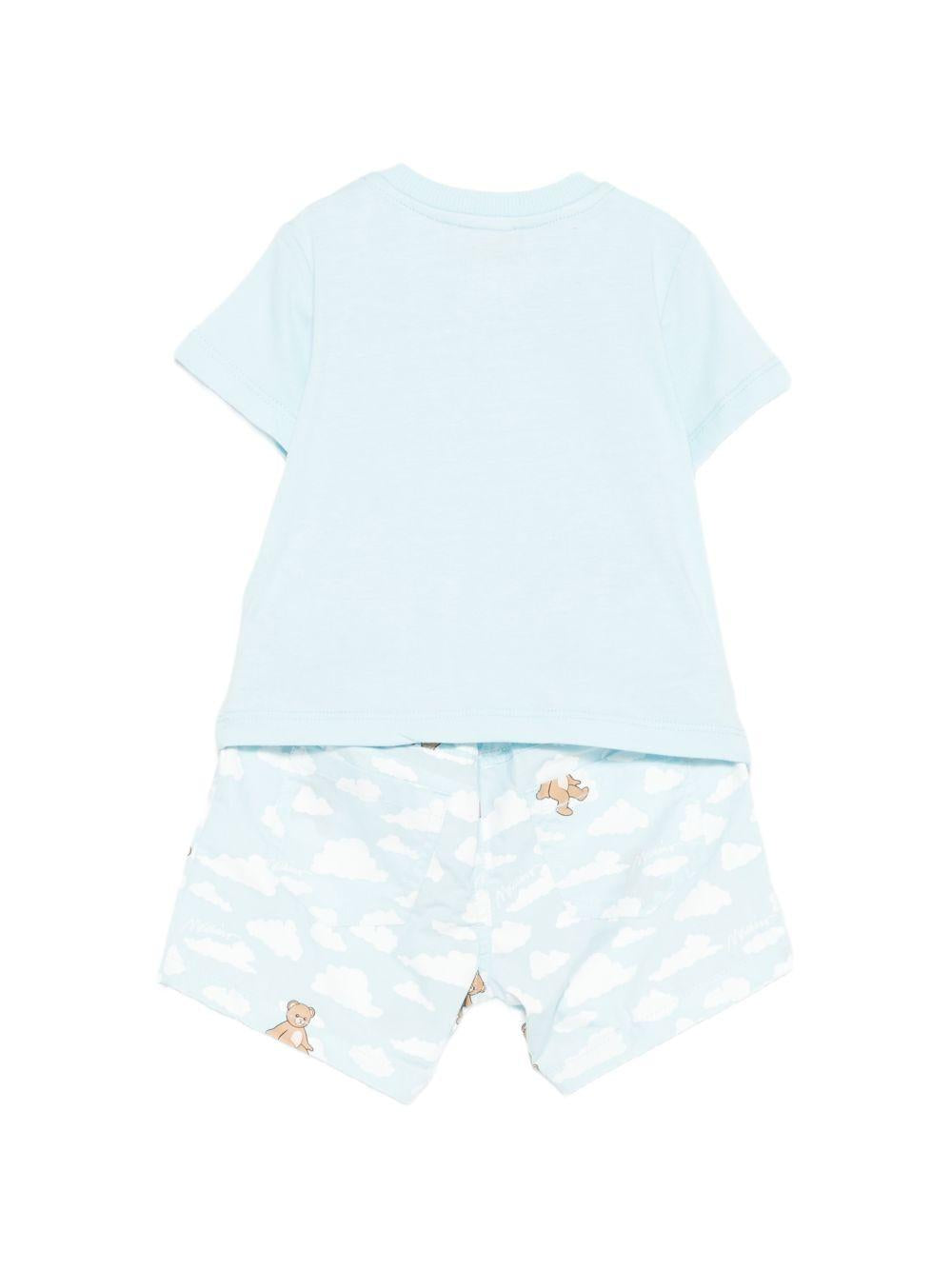 Set T-shirt e shorts per neonato Moschino Kids azzurro con stampa nuvole MUG01QLLB61 83679 MOSCHINO KIDS