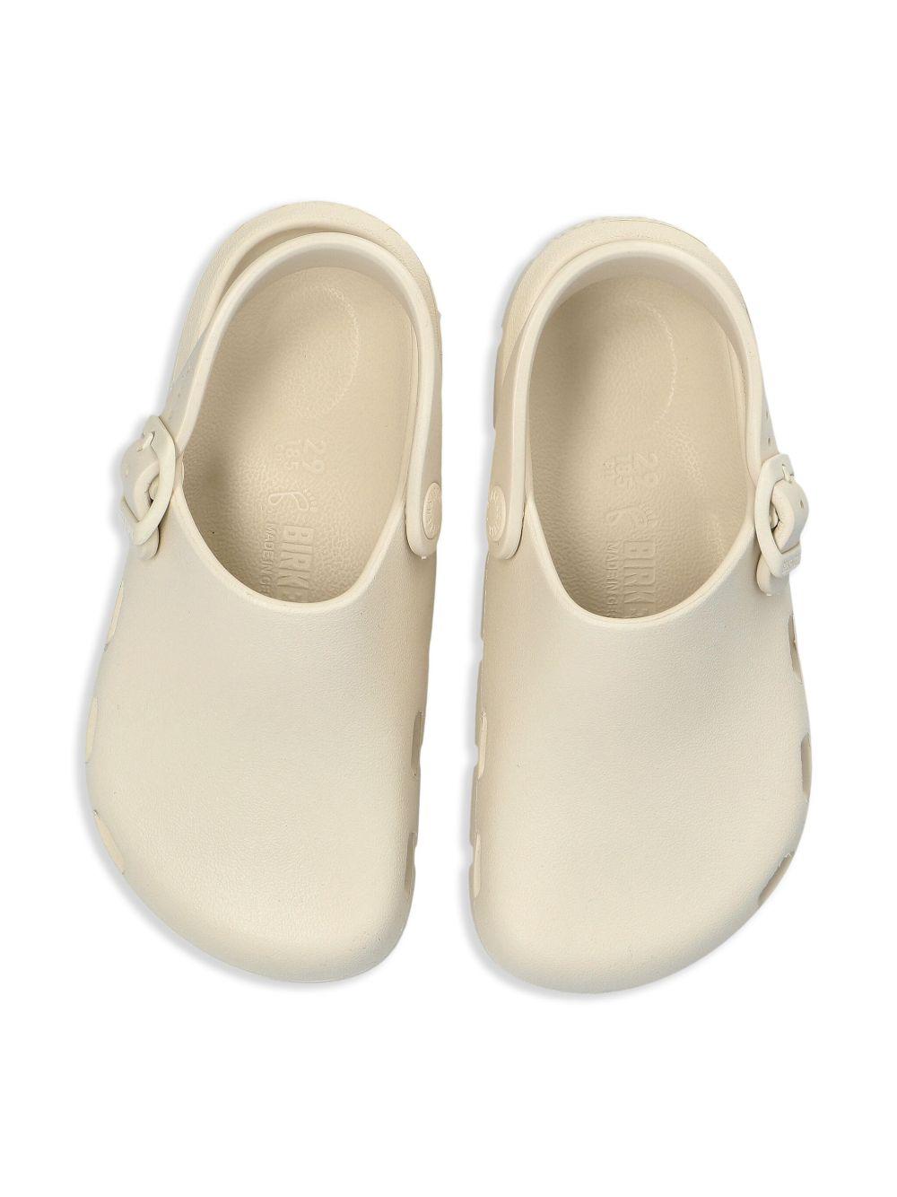 Sandali per bambini Birkenstock Kids Birki Flow beige con cinturino alla caviglia 1029567 EGGSHELL BIRKENSTOCK