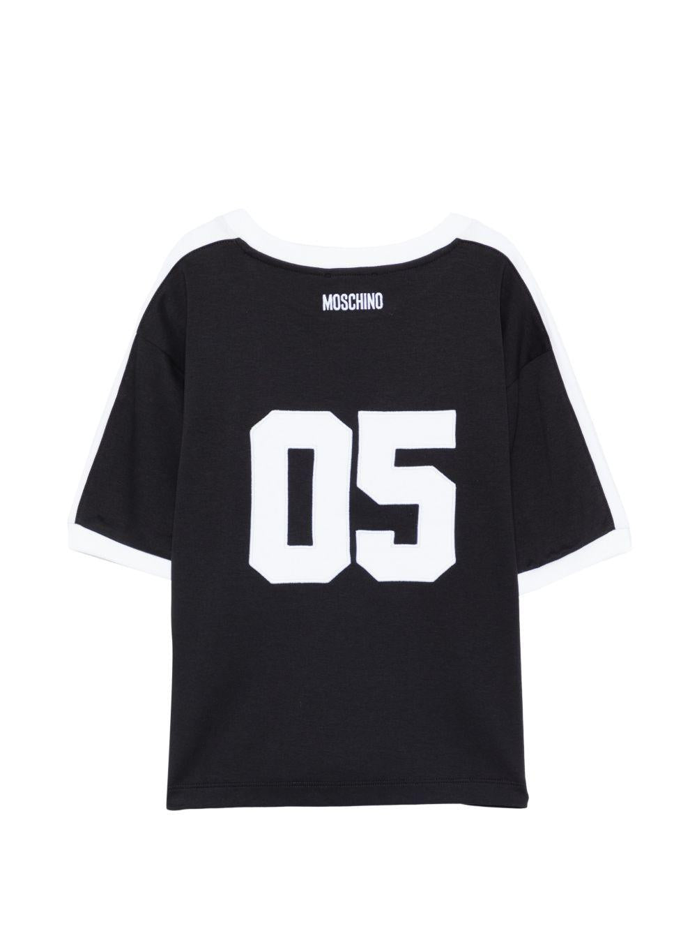T-shirt per bambino Moschino Kids nera con stampa smile sul davanti HUM05NLAA43 60100 MOSCHINO KIDS