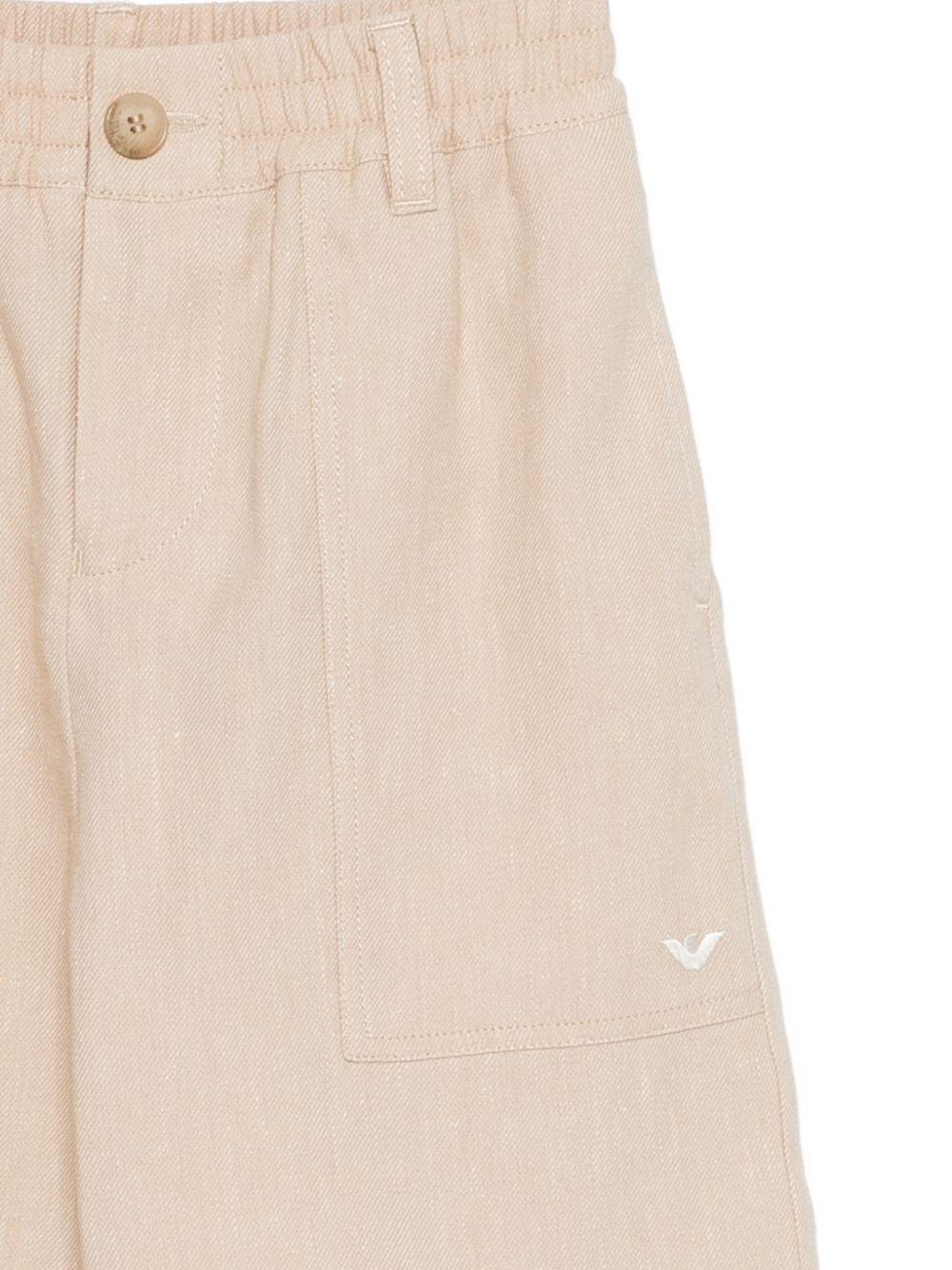 Shorts per bambino Emporio Armani Kids beige con logo aquila sul davanti EB001063 AF20957 U6151 EMPORIO ARMANI KIDS