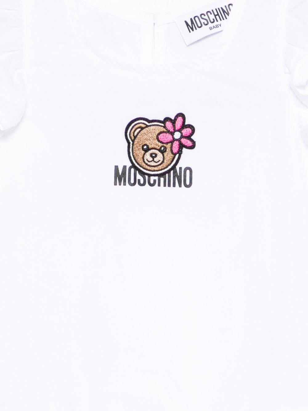 Abito per neonata Moschino Kids bianco con ricamo Teddy Bear sul davanti MDV0D6LLA10 10101 MOSCHINO KIDS