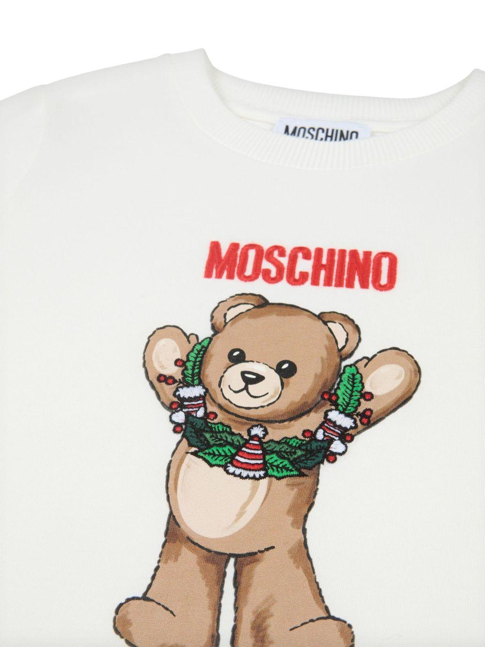 T-shirt per bambini Moschino Kids bianco con stampa grafica Teddy HUM05HLAA01 10063 MOSCHINO KIDS
